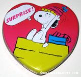 Snoopy wearing party hat 'Surprise' heart-shaped Tin