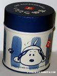 Snoopy on ground wagging his tail Tin Container