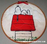 Snoopy on doghouse Fabric in Hoop