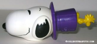 Snoopy wearing spinning top hat with Woodstock Toy