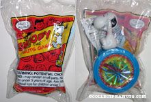 Snoopy riding on wheel toy Snoopy & the Peanuts Gang Series