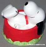 Snoopy laying in dogdish Paperweight