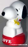 Snoopy hugging Woodstock on red 'Love' base Paperweight