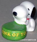 Snoopy leaning on green disc 'Thinking of You' Paperweight