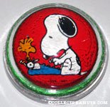 Snoopy at typewriter with Woodstock glass dome Paperweight