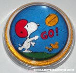 Snoopy and Woodstock playing Football glass dome Paperweight