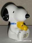 Snoopy sitting Holding Woodstock