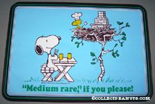 Snoopy at picnic table and Woodstock grilling in nest 'Medium Rare if you please' Placemat