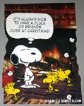 Snoopy and Woodstocks by fireplace