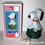 Snoopy sitting on grass Radio