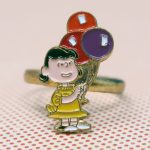 Lucy holding balloons Ring