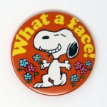 Snoopy kneeling with flowers ‘What a Face!’ Mini Mirror