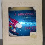 Snoopy and Woodstock Sledding Satin Ball Ornament