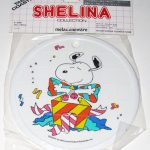 Snoopy popping out of gift package Melamine Trivet