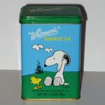Snoopy surprising Woodstock Surprise Tin