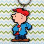 Charlie Brown putting on jacket Keychain