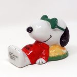 Joe Cool laying on rock Paperweight