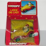 Snoopy & Woodstock in yellow & red Roadster Car