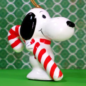 Snoopy sitting holding wreath Christmas Ornament