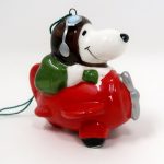 Snoopy in Plane Ceramic Christmas Ornament
