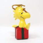 Woodstock sitting on gift package Ornament