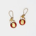 Snoopy laying on letter O Earrings