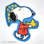 Snoopy in robe carrying Woodstock Pajama Bag