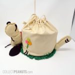 Snoopy laying on back in grass Curler Caddy