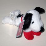 Snoopy laying on heart Plush