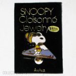 Snoopy on Skis with goggles in front of Mountain Pin