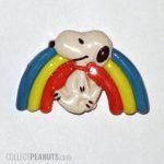 Snoopy walking in front of rainbow Pin