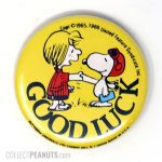 Peppermint Patty shaking Snoopy Flying Ace's Hand 'Good Luck' Button