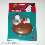 Snoopy and Woodstock Laying on Football Ornament