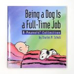 Being a Dog is a Full-Time Job Peanuts Book