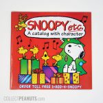 Snoopy and Woodstocks singing with pile of Christmas presents