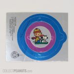 Charlie Brown and Snoopy on sled round ornament by Interstate Brands