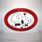 Peanuts 40 Years of Happiness Sign in English and French