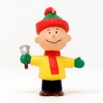 Charlie Brown holding Bell Ornament