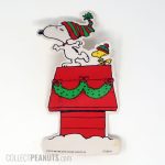 Snoopy and Woodstock dancing on Christmas doghouse Gift Trim