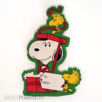 Snoopy bring wrapped by Woodstocks Christmas Gift Tags