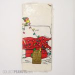 Snoopy and Woodstock decorating Christmas Doghouse Tablecloth