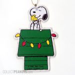 Snoopy hugging Woodstock on Doghouse Wooden Christmas Ornament