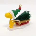 Woodstock with Tree on Sled Christmas Ornament