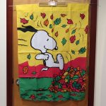 Snoopy Jumping in Pile of Leaves Flag
