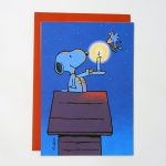 Snoopy Holding Candle for Woodstock Christmas Greeting Card