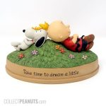 Charlie Brown, Woodstock and Snoopy laying on Hill 'Dream' Figurine