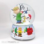 Snoopy, Woodstock and Charlie Brown decorating Charlie Brown Christmas Tree Snow Globe