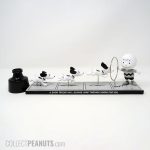 Snoopy jumping through hoop for Charlie Brown Comic Strip Figurine