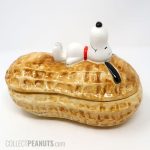 Snoopy laying on top of peanut Nut Dish 