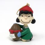 Lucy Holding Football Christmas Ornament